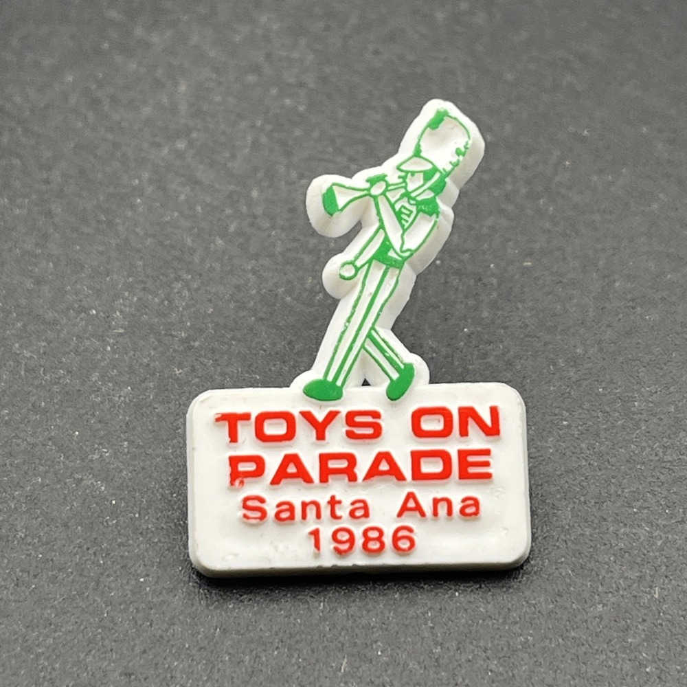 Toys On Parade Santa Ana 1986 Plastic Lapel Hat Pin
